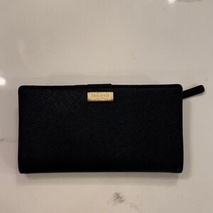 kate spade black wallet with gold plaque